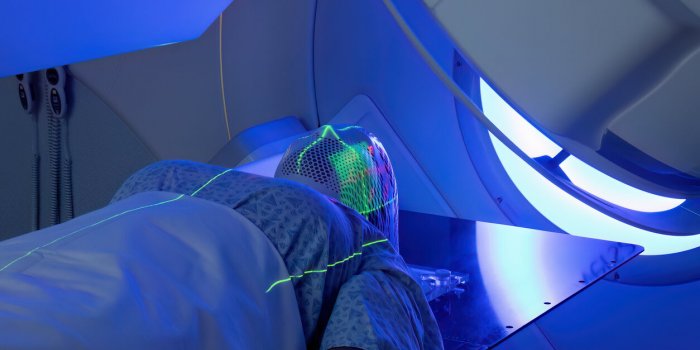 woman receiving radiotherapy treatments for cancer