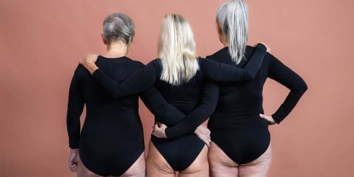 rear view of three senior friends, body positivity concept