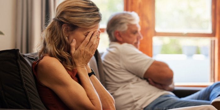 crying, divorce and fight with a senior woman sad in her home after an argument with her husband depression, stress and c...