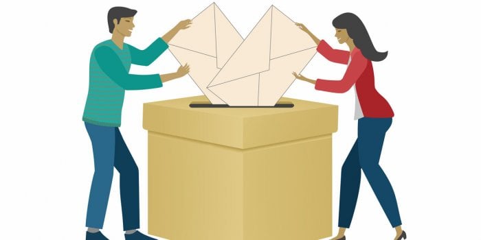 man and woman leaving their votes in polling box with big envelopes the importance of say your opinion vote, election iso...